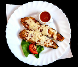 CUKINIA FASZEROWANA /  Gefüllte Zucchini  2 szt. 400g